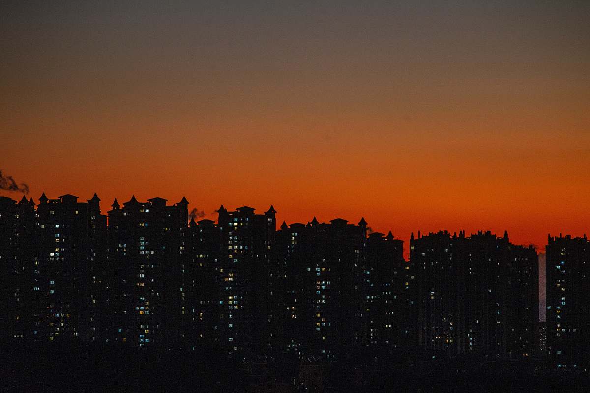 outdoors silhouette of buildings during golden hour dawn