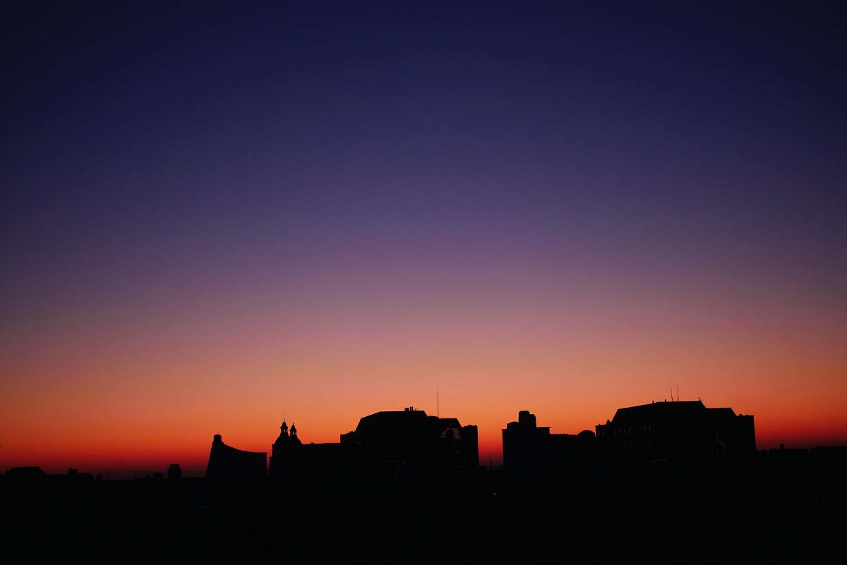 sunset silhouette of buildings\ sky