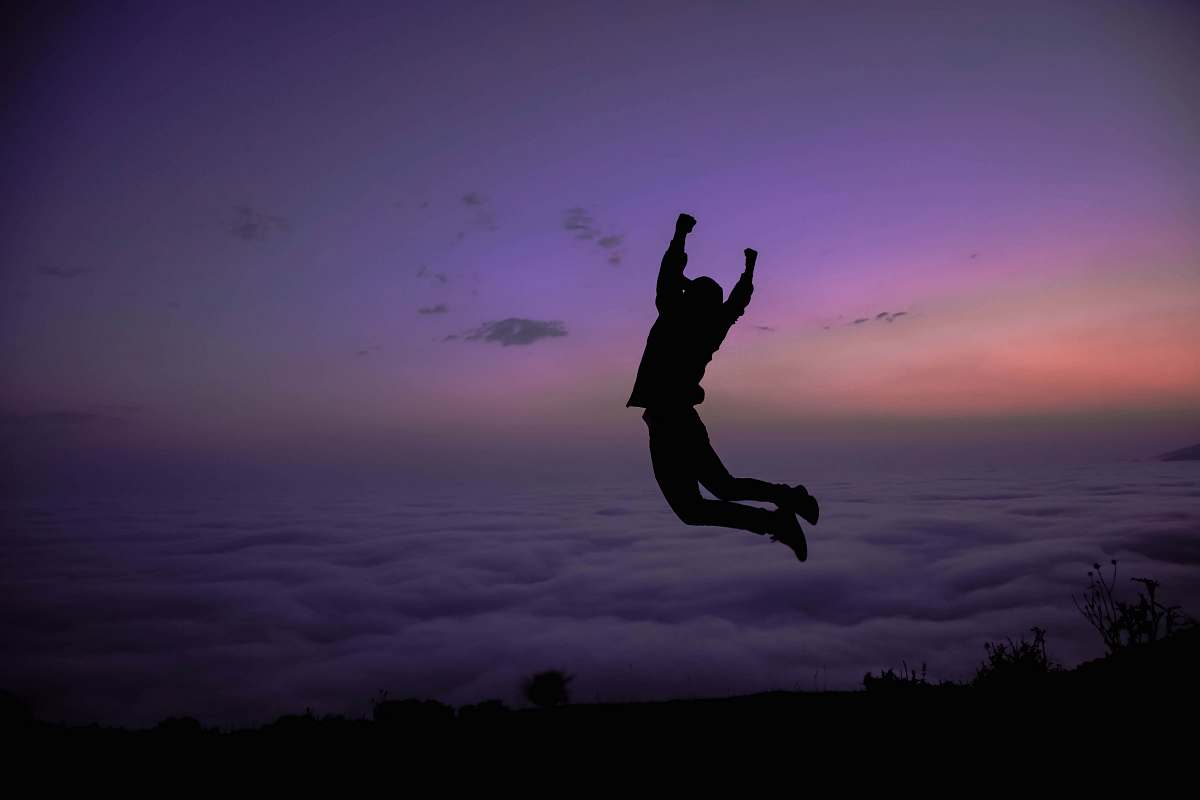 adventure silhouette of jumping in mid air during golden hour leisure activities