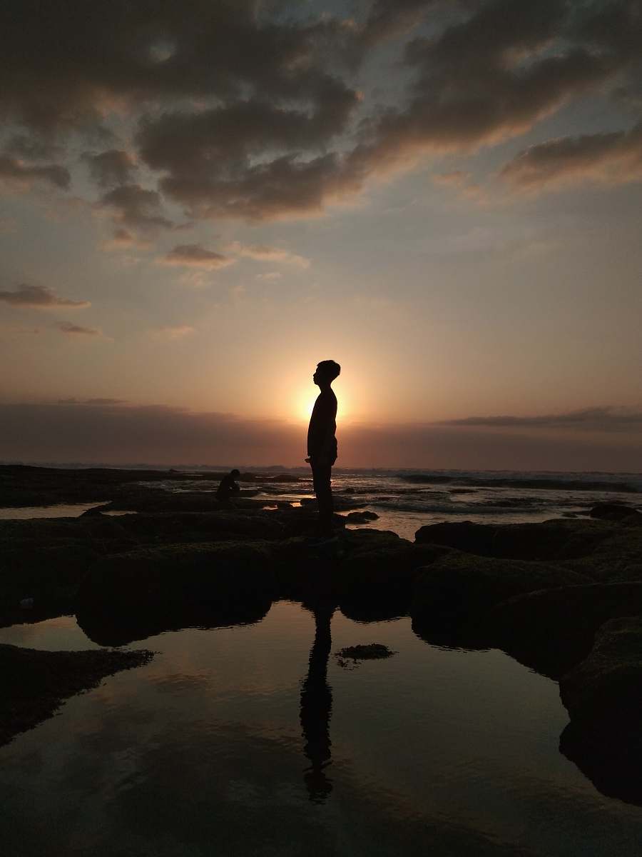 outdoors silhouette of person standing while facing left side silhouette