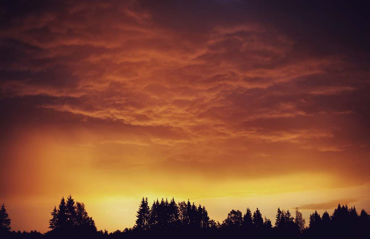 outdoors silhouette on mountain during golden hours sky