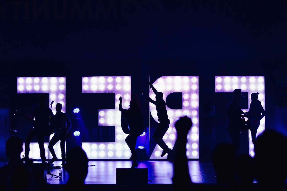 silhouette silhouette of people with free marquee letters music