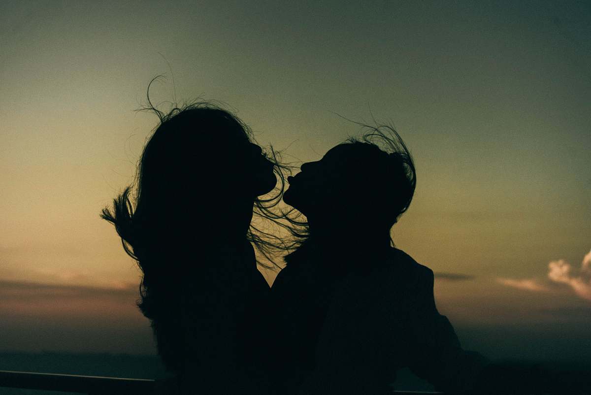 human silhouette photograph of two girls person