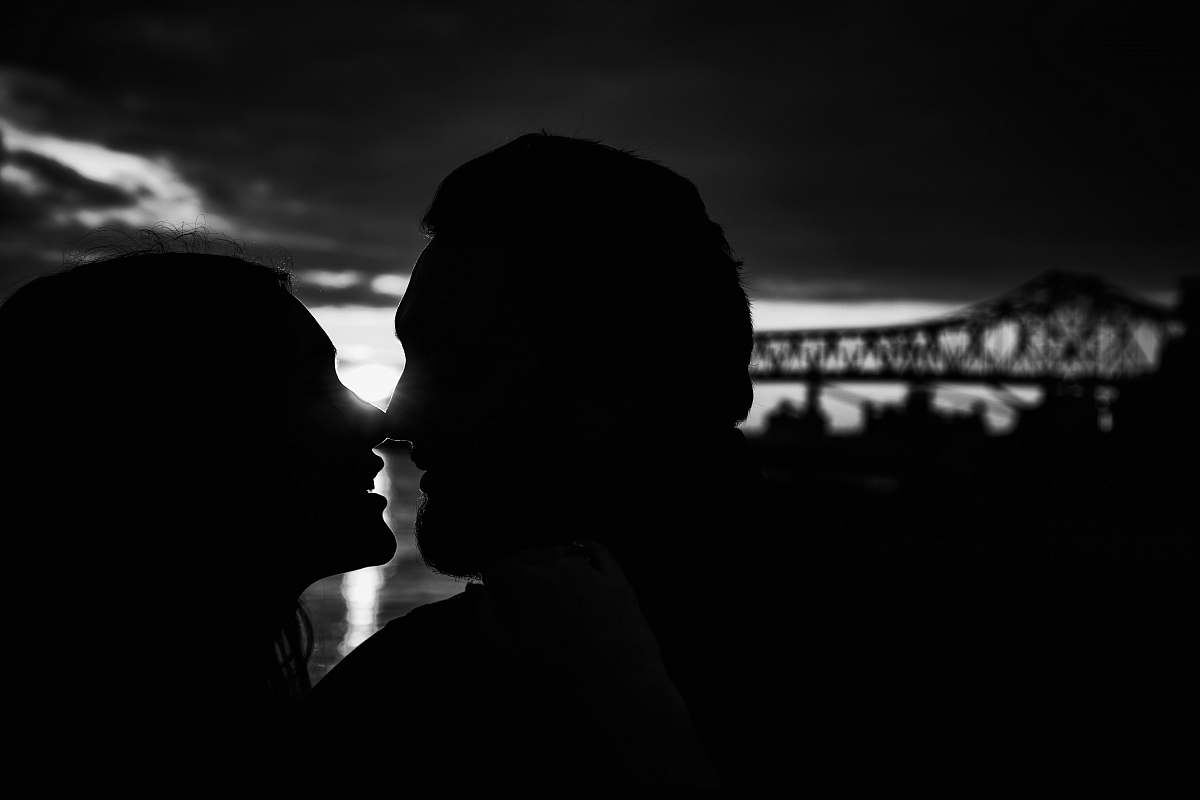 human couple kissing silhouette