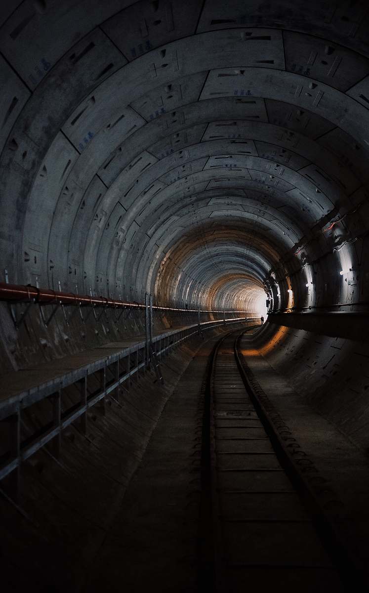 tunnel photo of train rail tunnel track