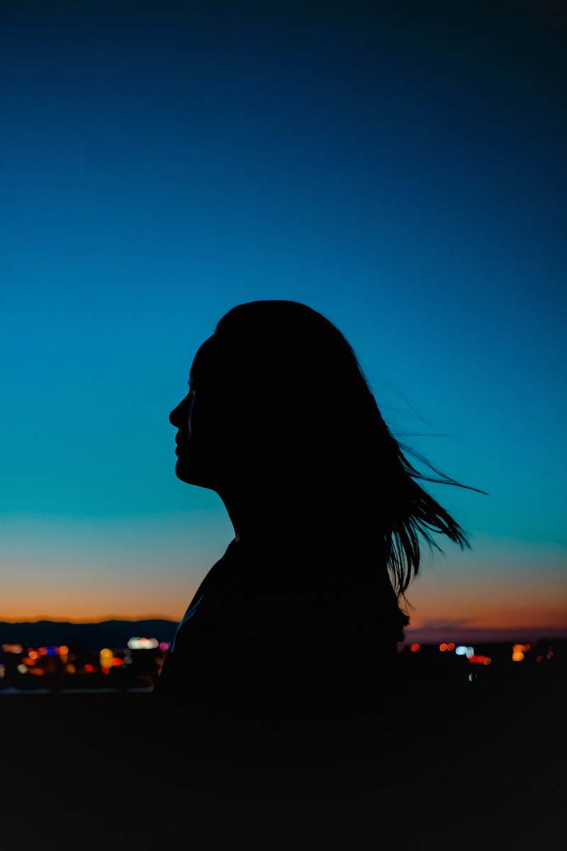 silhouette silhouette of a woman at sunset human