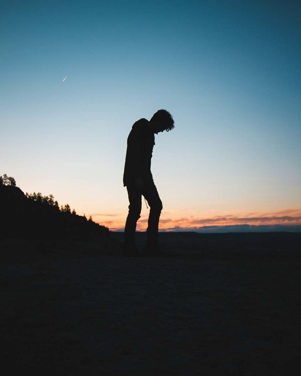 Silhouette Silhouette Of Man Bowing Down Human Image Free Photo