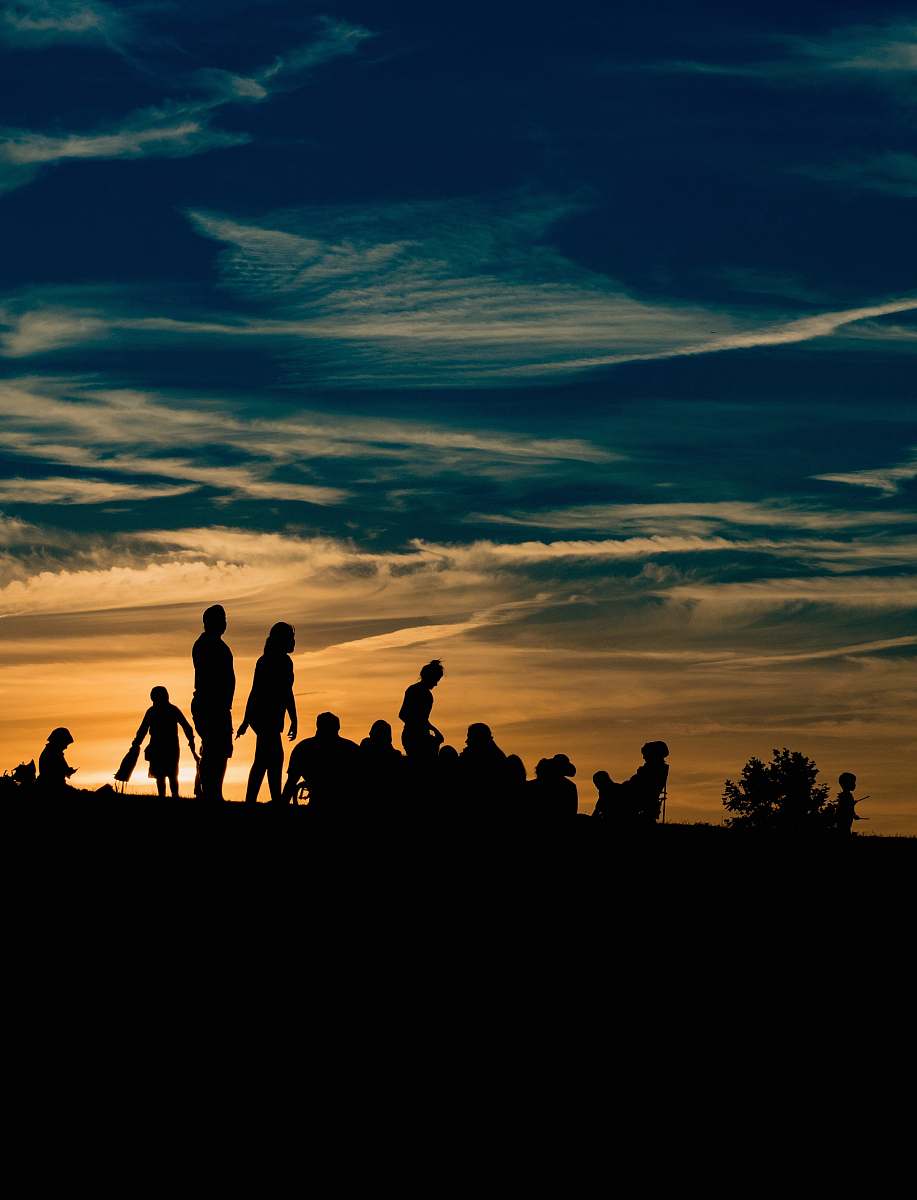 silhouette silhouette of people during golden hour human