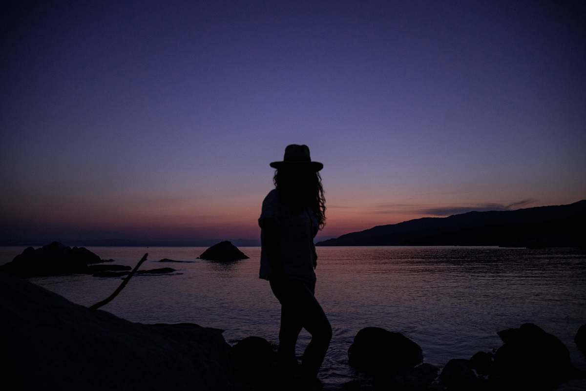 apparel silhouette of person near ocean clothing