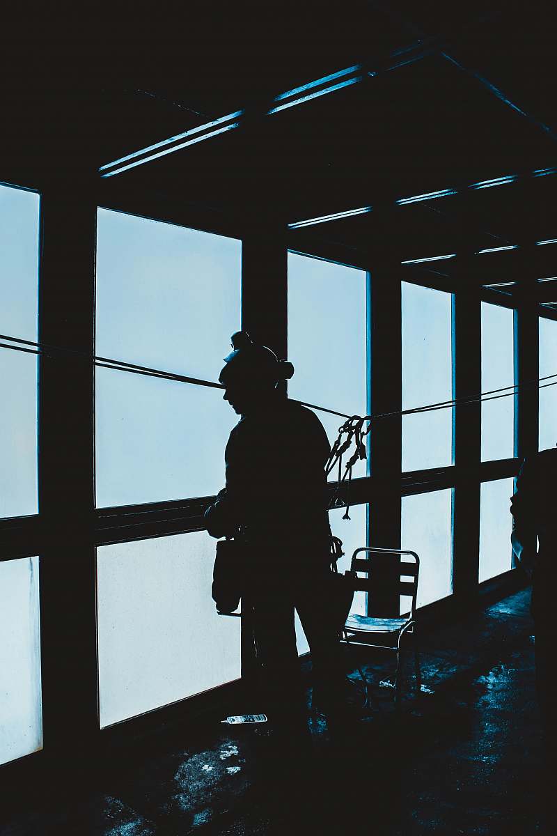 human silhouette of woman standing inside room people