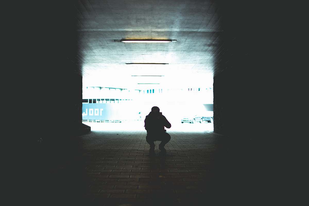 human silhouette photography of man sitting people
