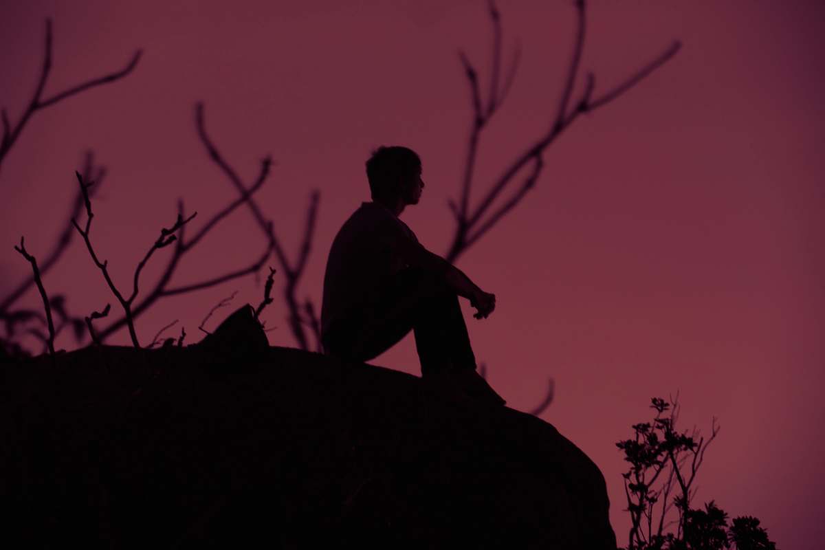 silhouette silhouette photography of person sitting human