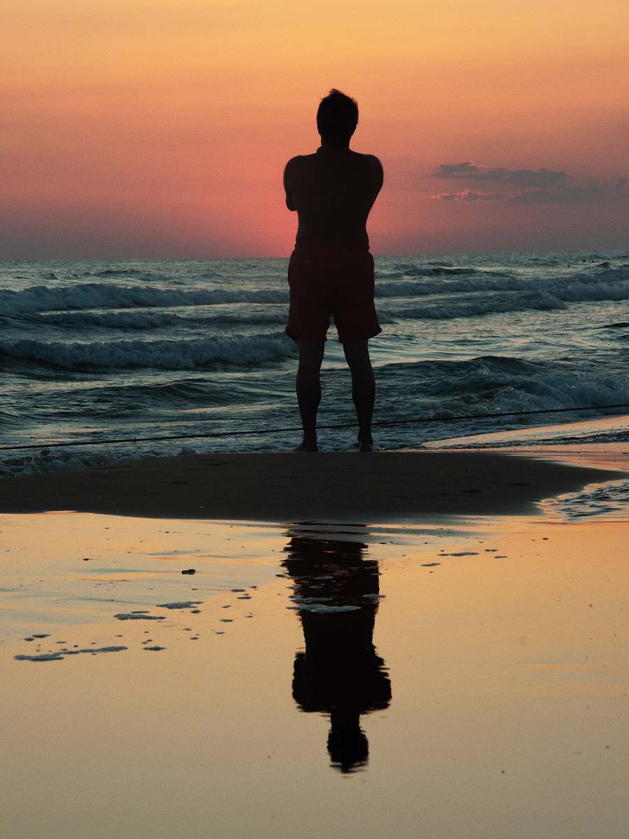 Silhouette Topless Person Standing Near Seashore Human Image Free Photo