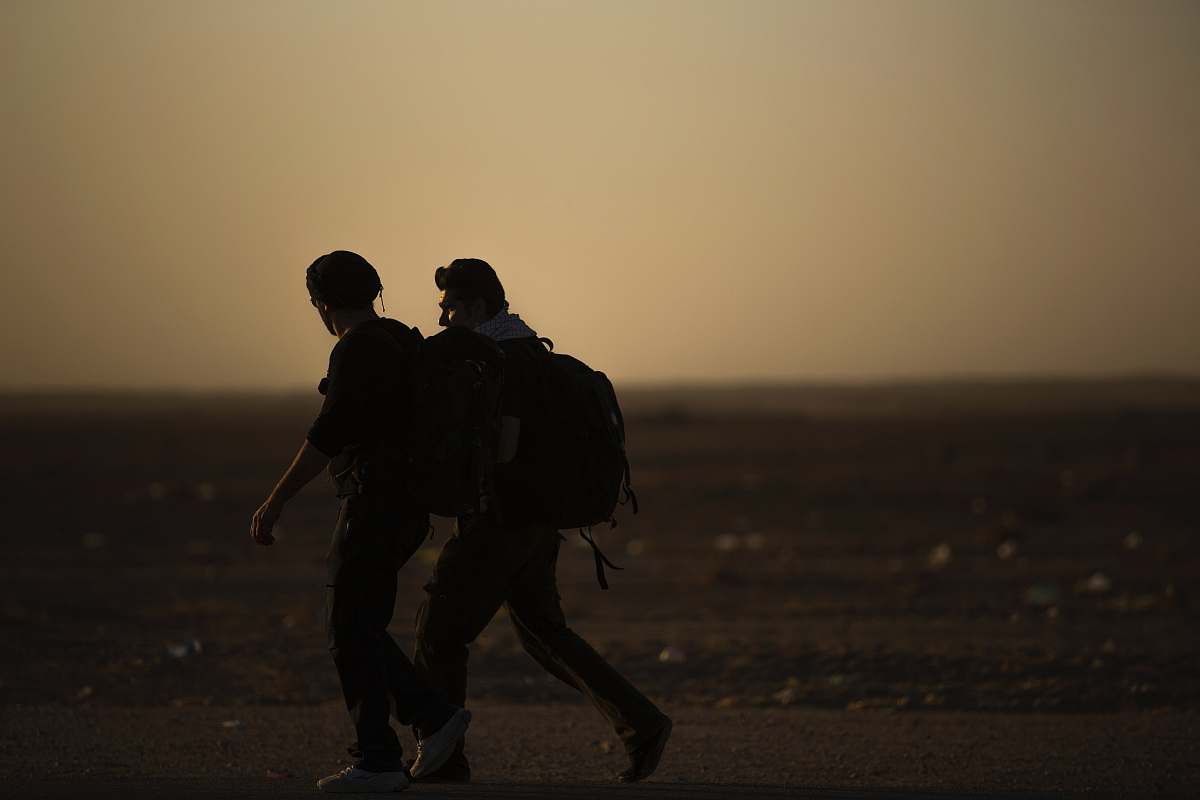 human two men walking silhouette