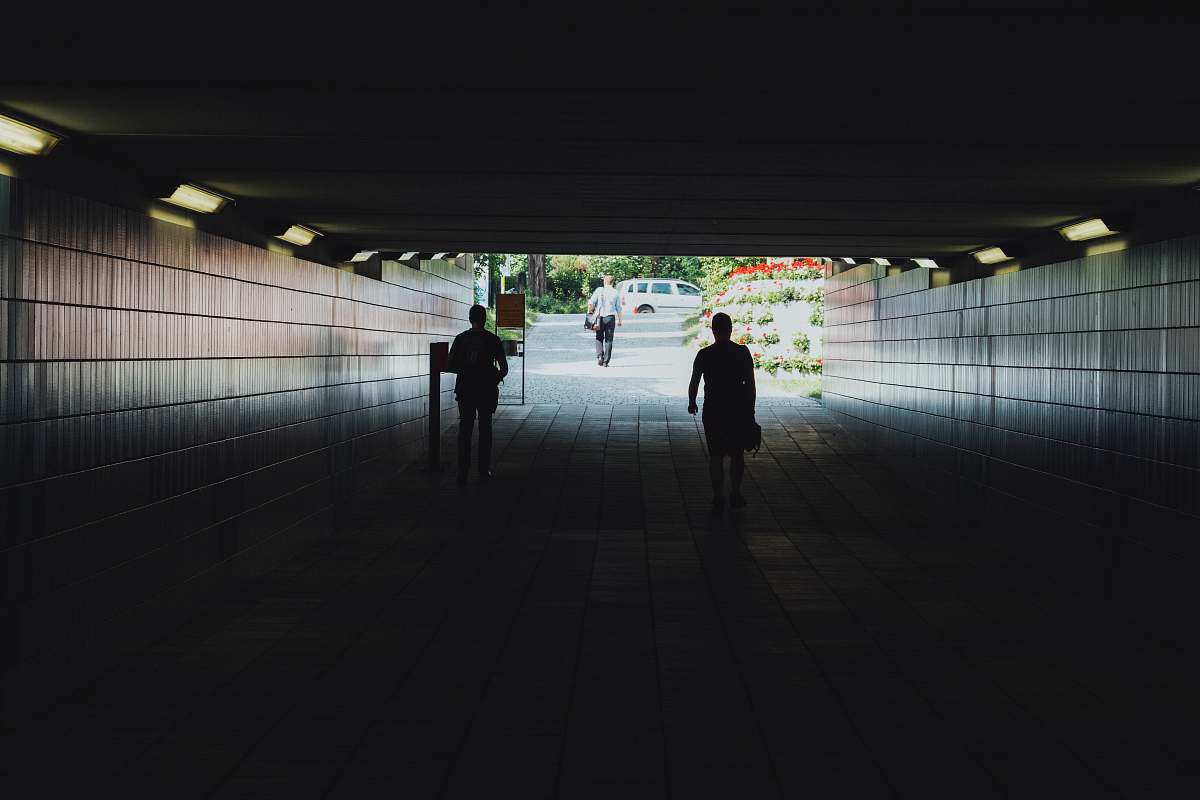 human two person in a subway during daytime pedestrian