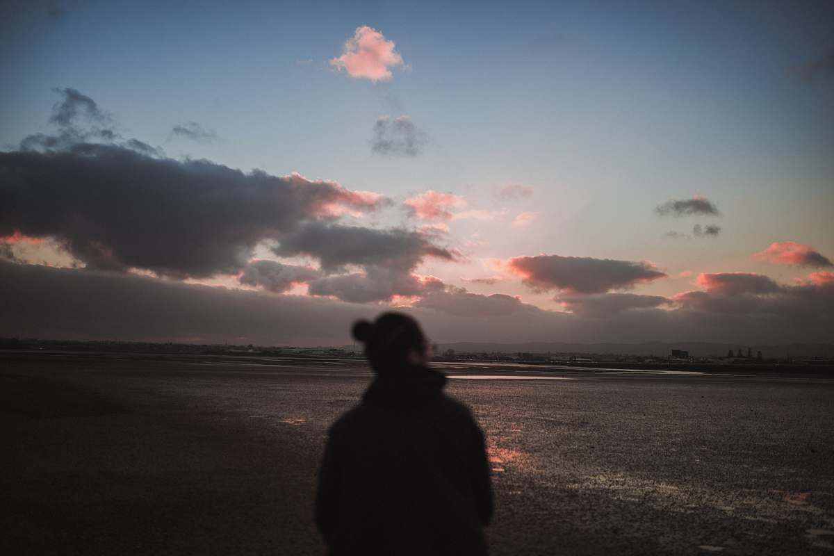 nature woman standing on sea shore sky