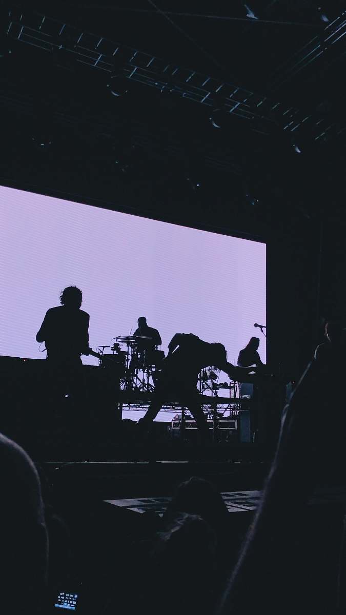 human band playing music at the stage person