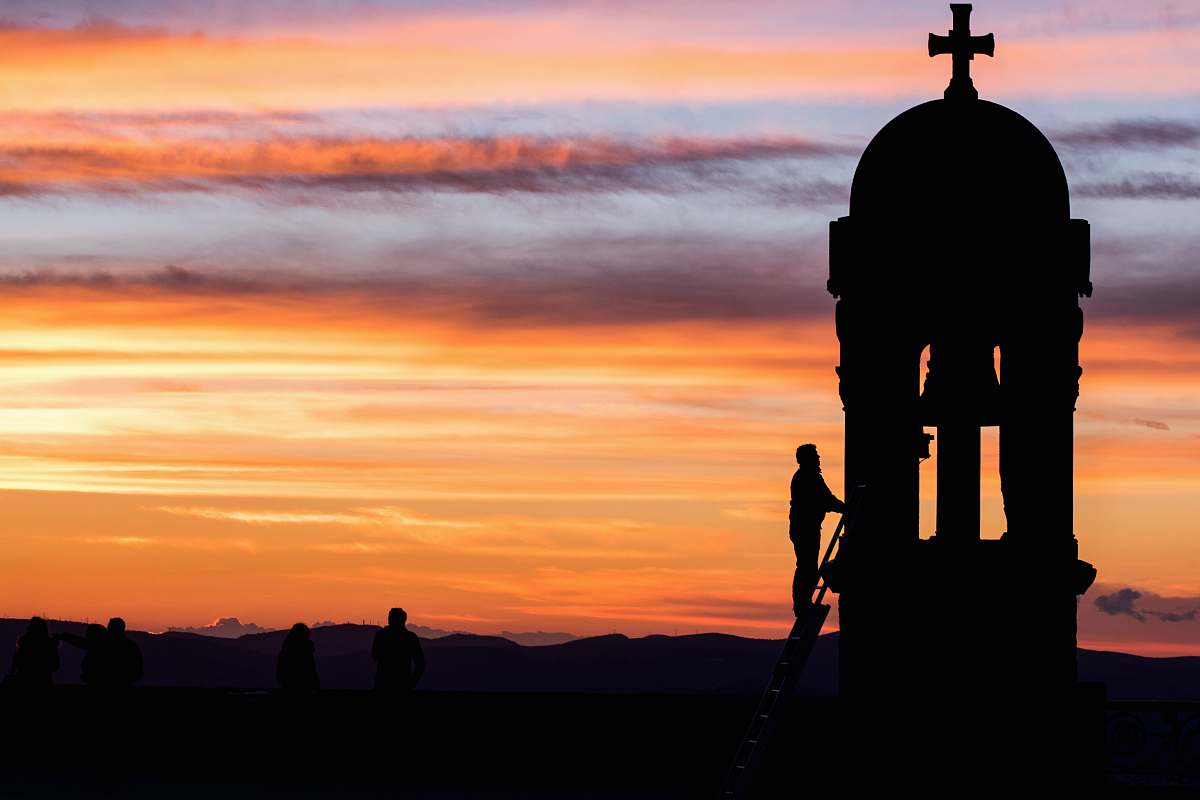 human church during golden hour person