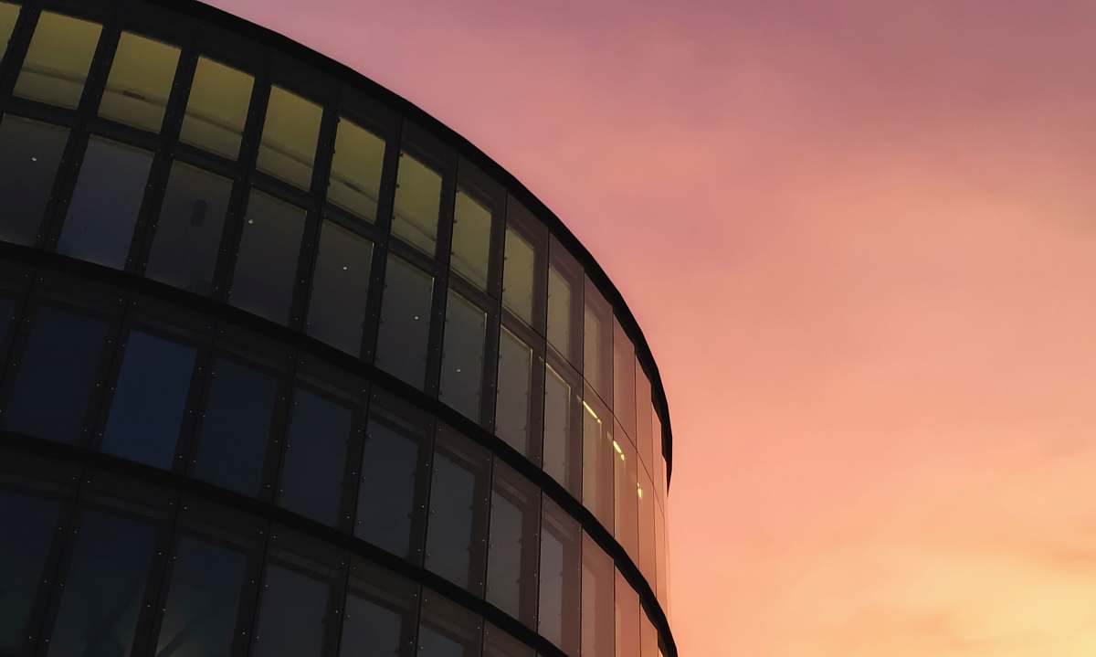building gray painted building with glass window office building