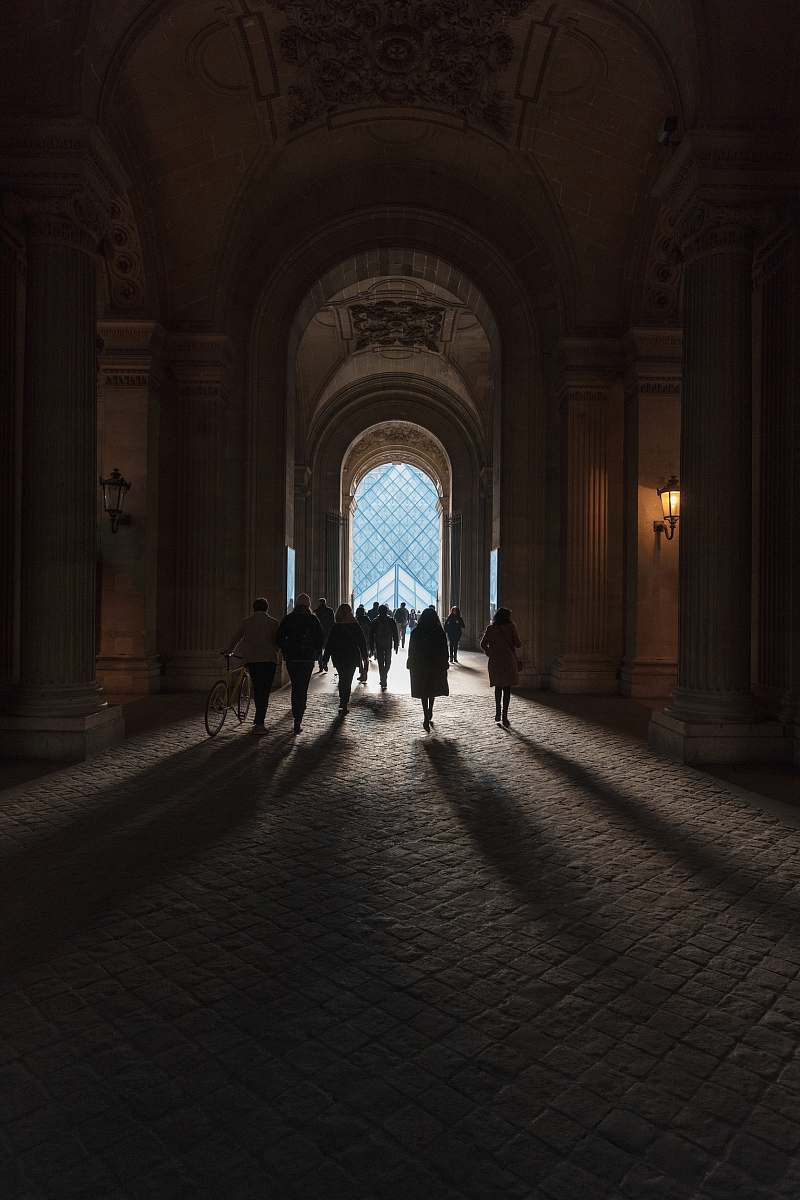 paris group of people walking outside france