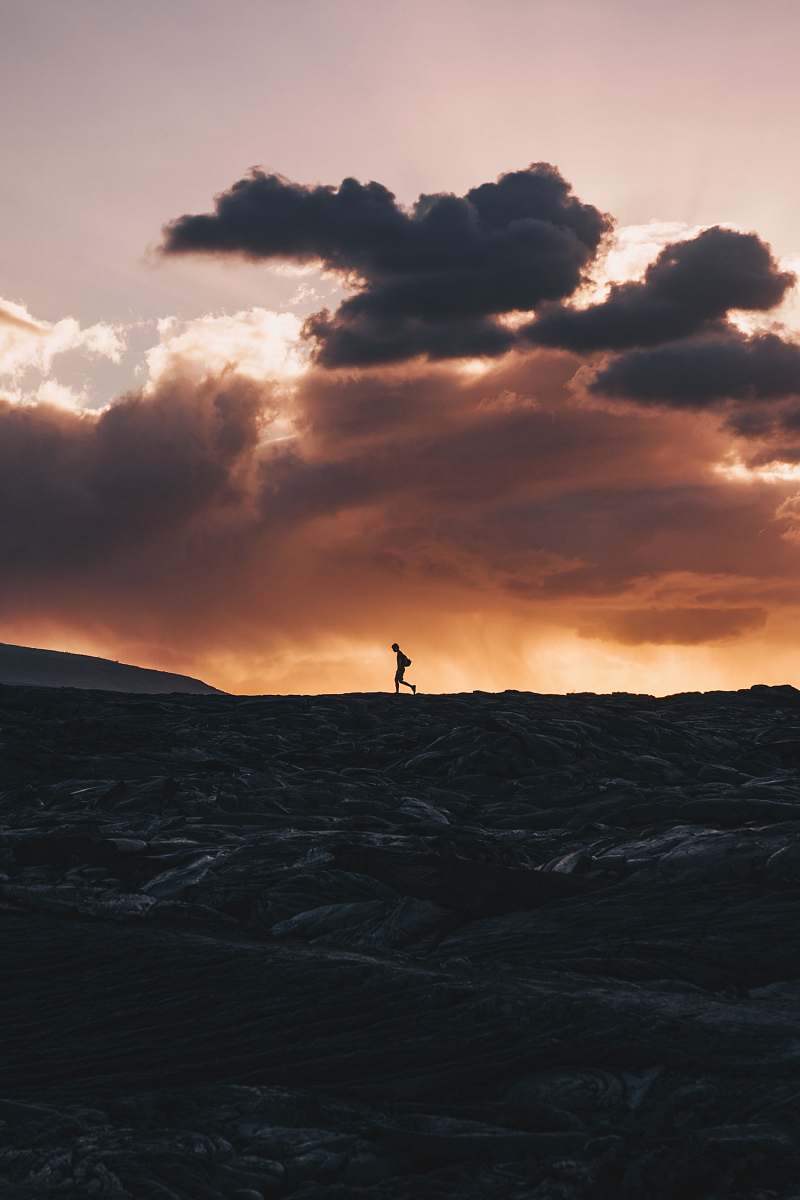 sky landscape photo of person walking on horizon cloud