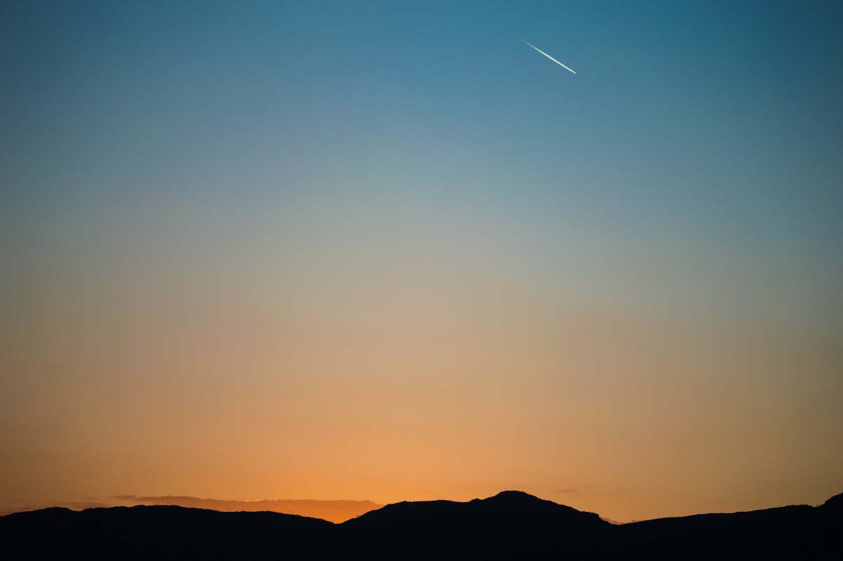 sky landscape photography of comet sunrise