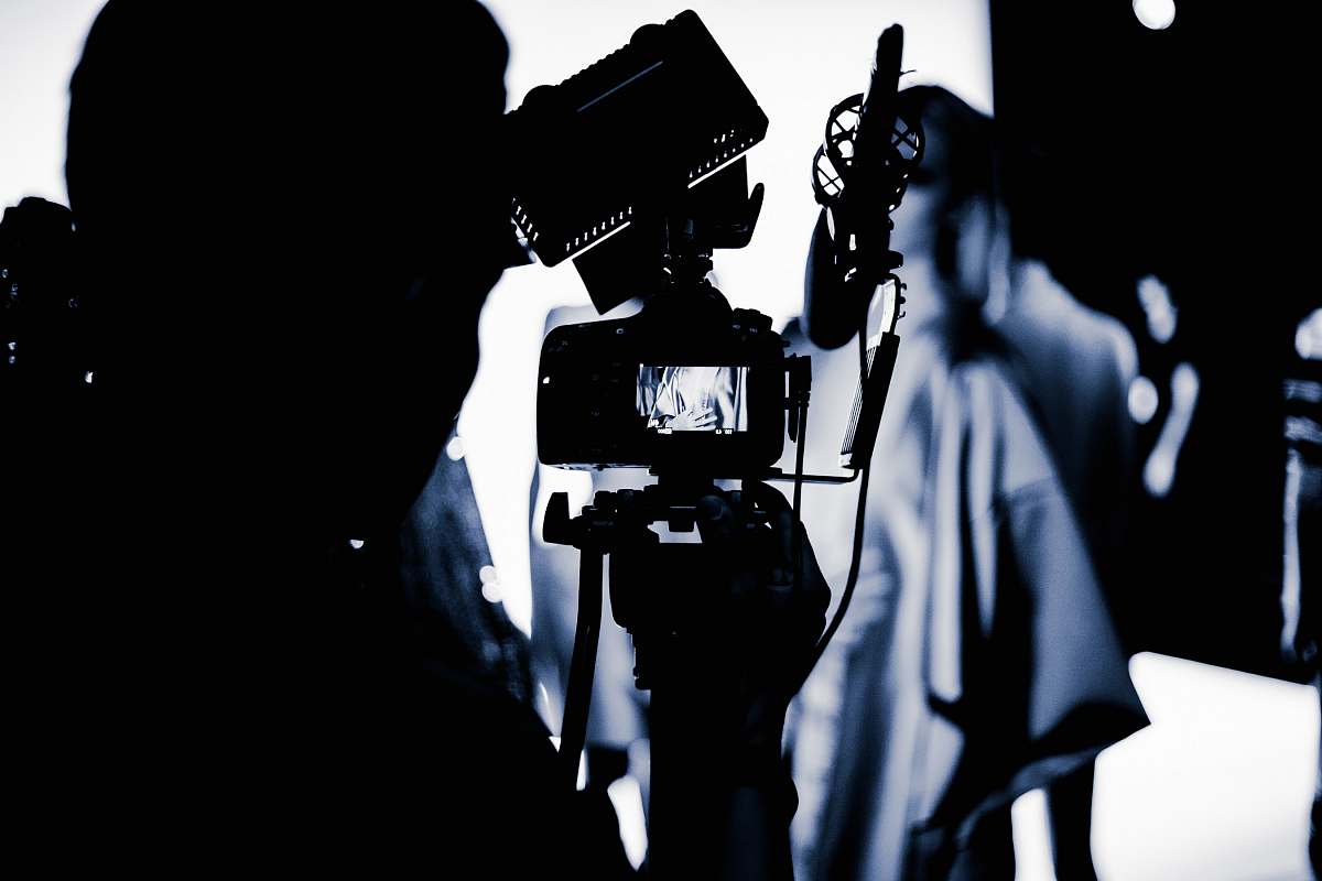 camera man capturing a photo photographer