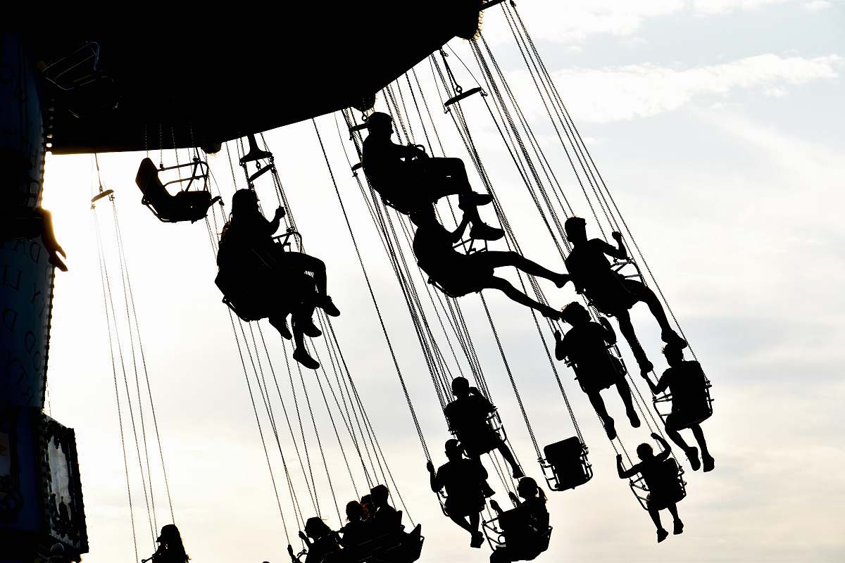 adventure people riding on swings grayscale photography leisure activities