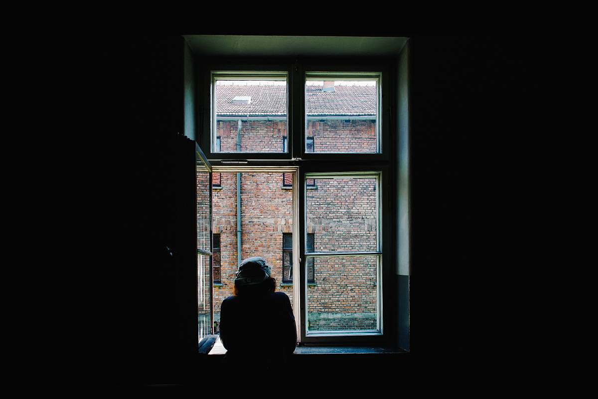 person person standing in front of open window window