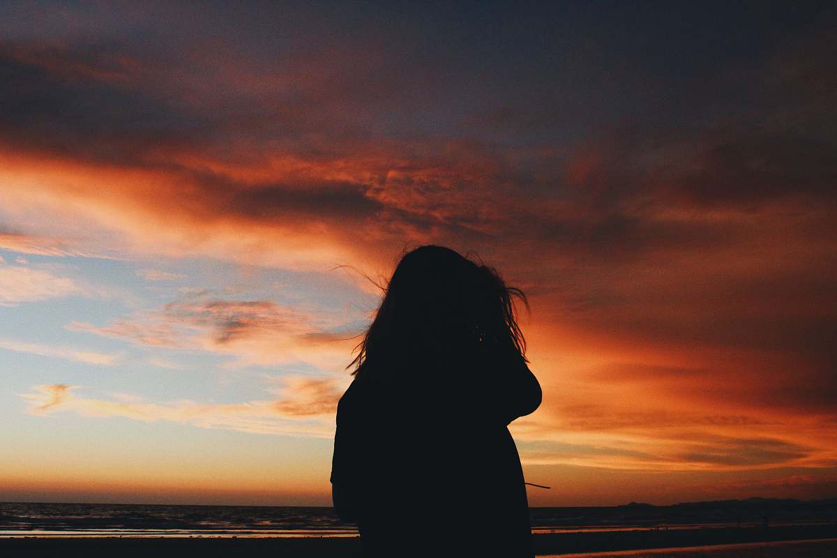 nature person standing near seashore outdoors