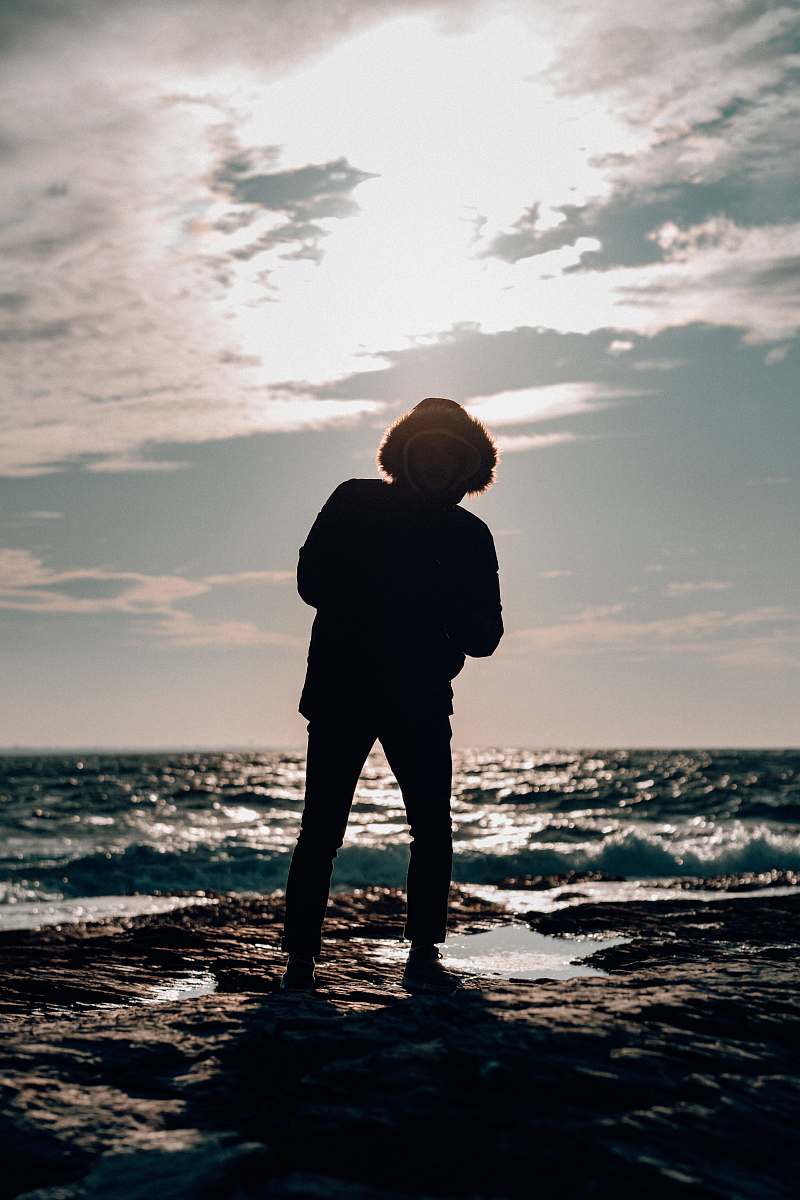 nature person standing on the seashore ocean