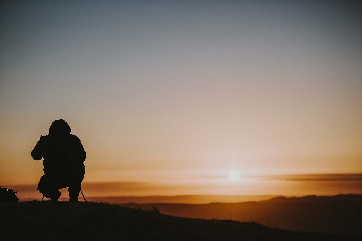 person person using camera during daytime human