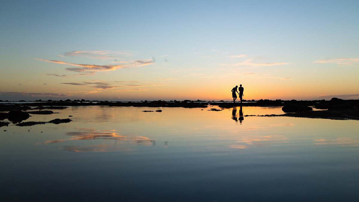 sunset rule of thirds photography of silhouette of two persons people