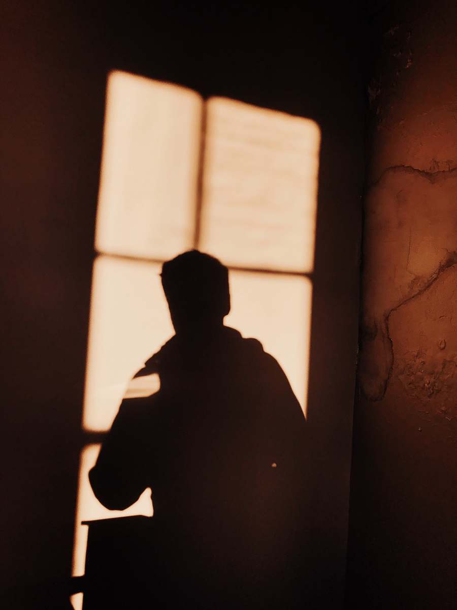 person shadow of person on wall human