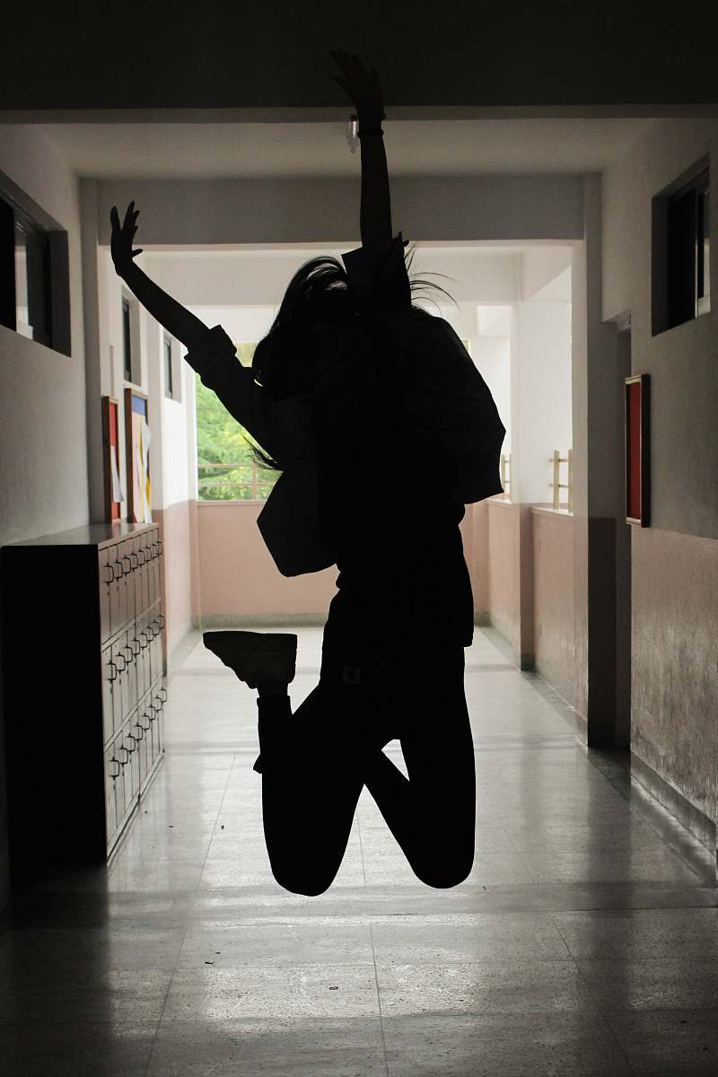 human silhoeutte of woman making a jump shot person