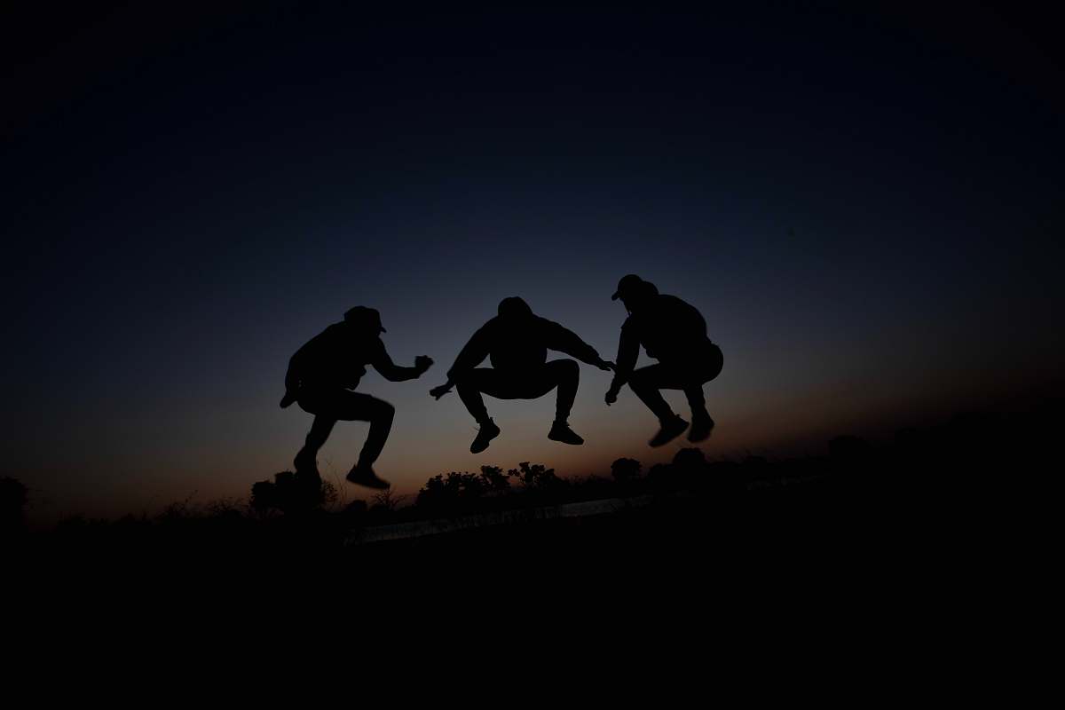 human silhouette of 3 person during dawn person
