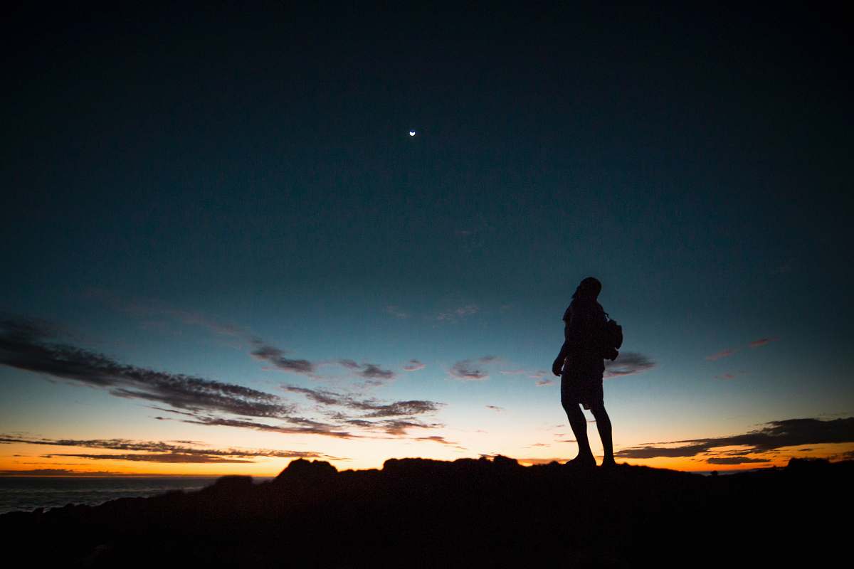 person silhouette of a person during sunset human