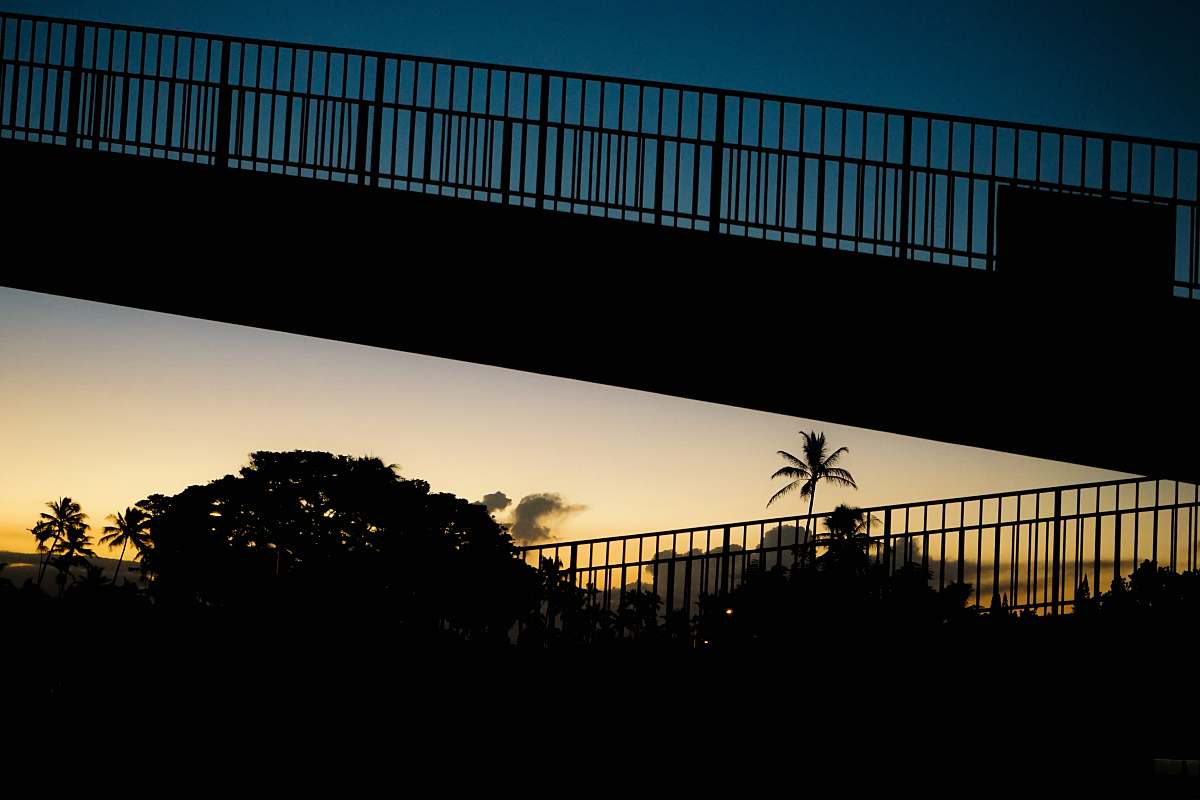 honolulu silhouette of bridge during golden hour freeway