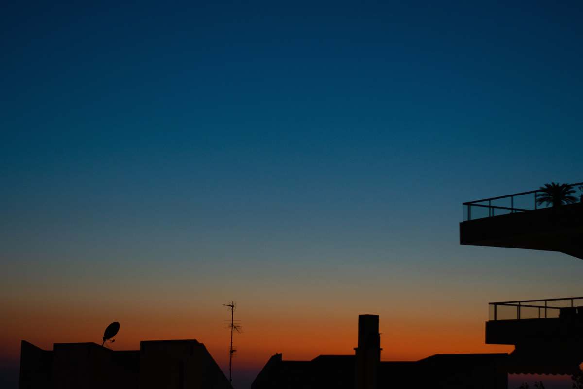 nature silhouette of building during golden hour outdoors