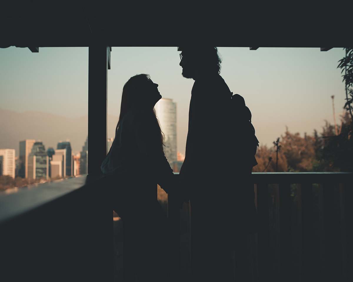 person silhouette of couple in terrace human