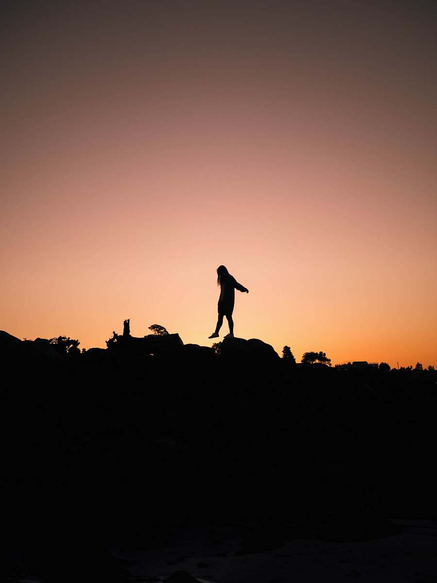 outdoors silhouette of girl during sunset standing