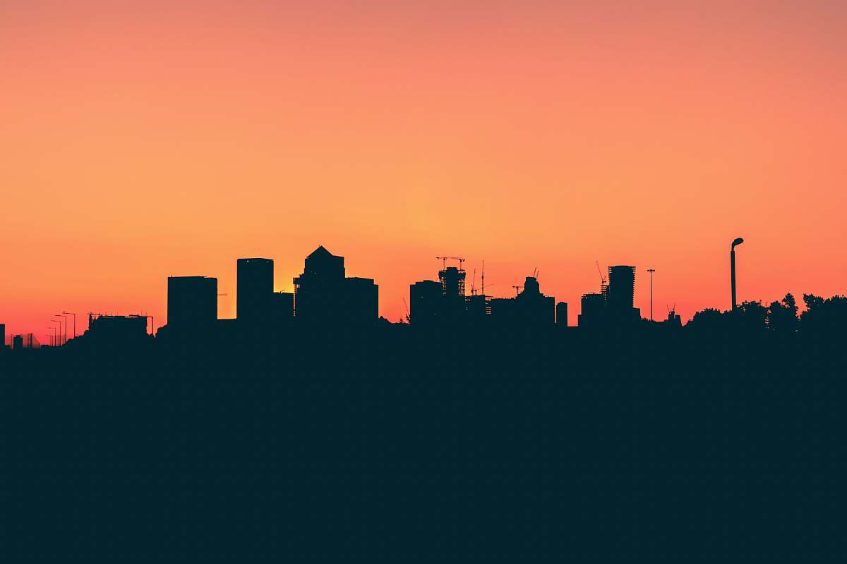 london silhouette of high-rise buildings under orange sky a102