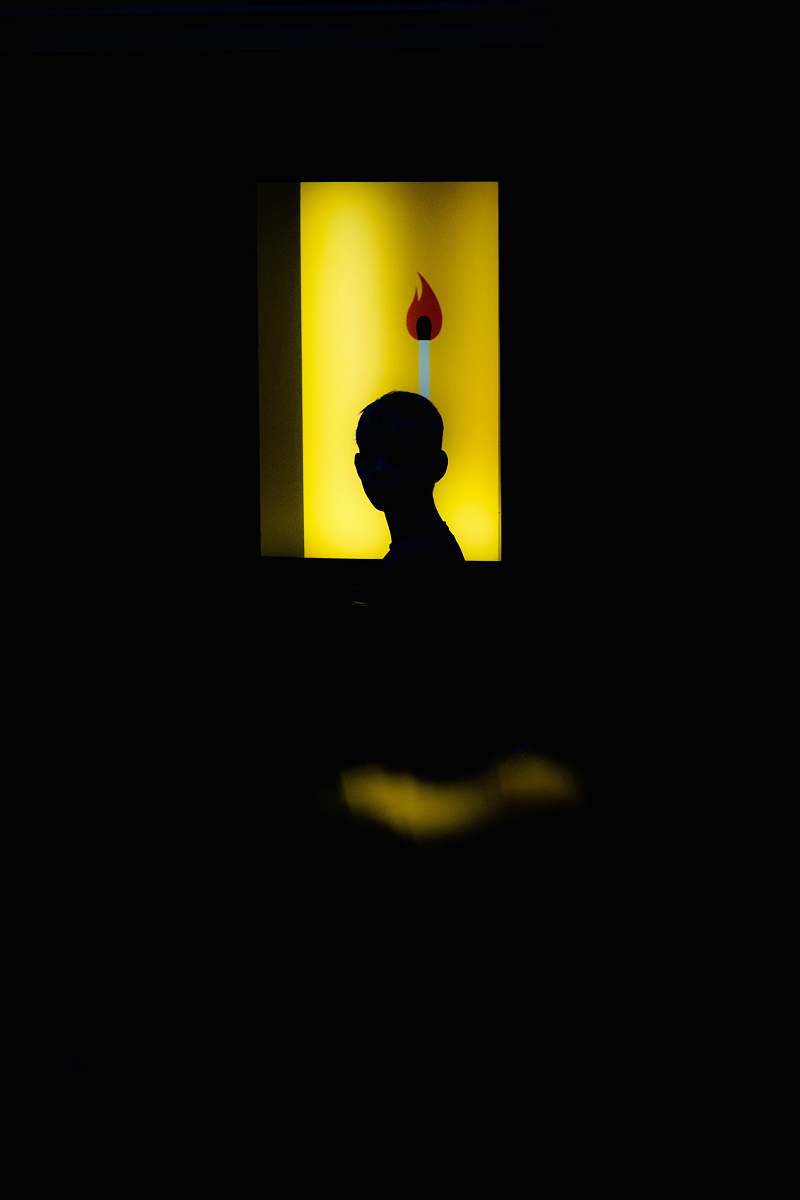 human silhouette of human toward with lighted room photography person