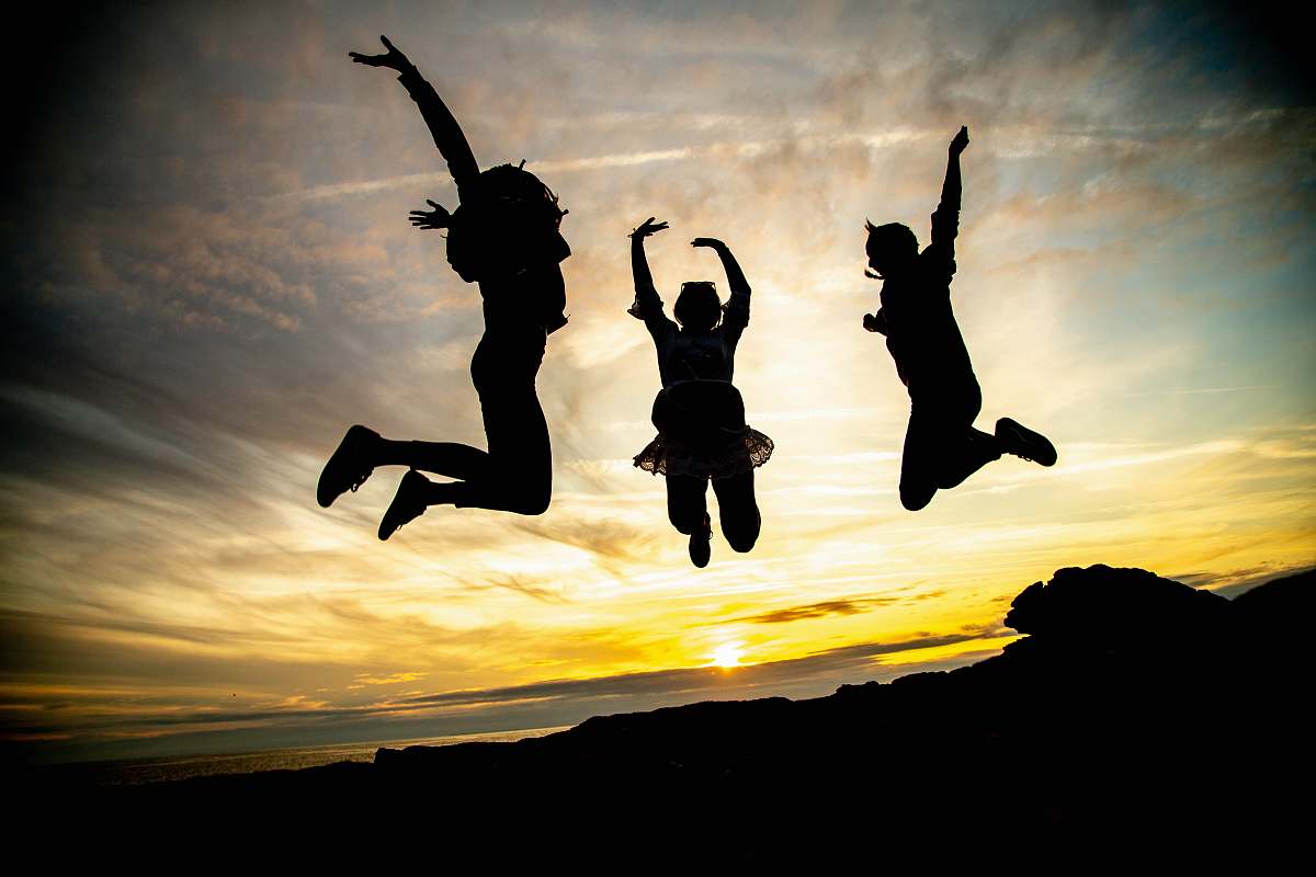 adventure silhouette of jumping people leisure activities