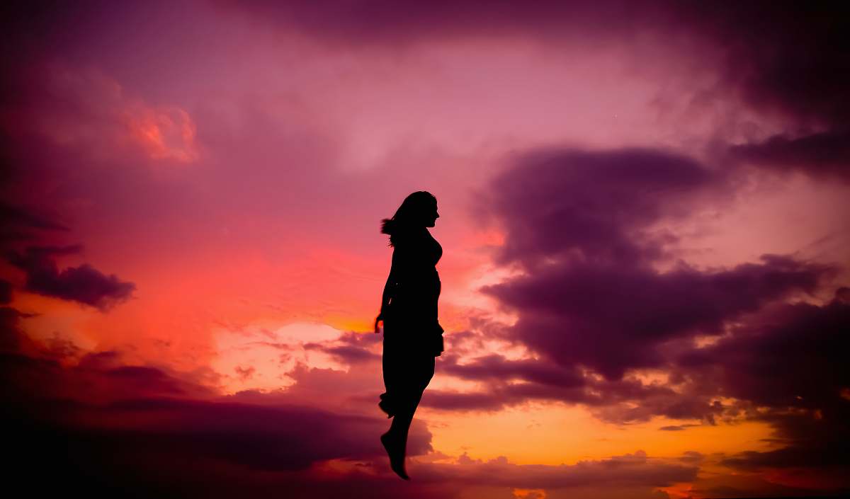 human silhouette of jumping woman person