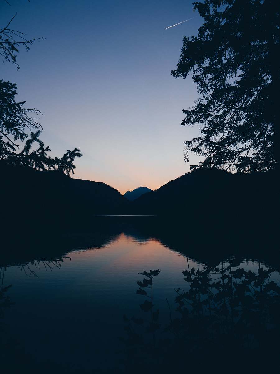 nature silhouette of mountain, lake and trees in nature photography outdoors