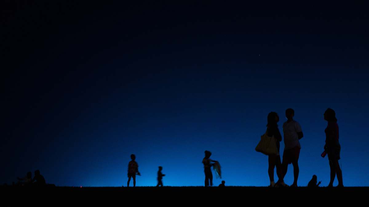 human silhouette of people during nighttime person