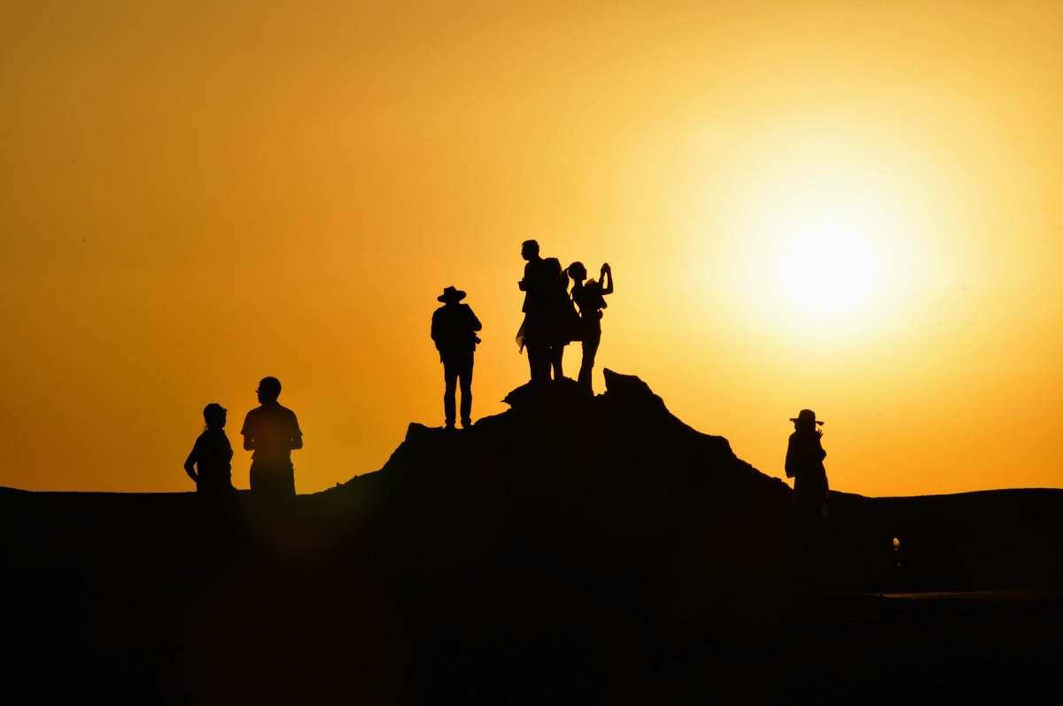 sun silhouette of people travel