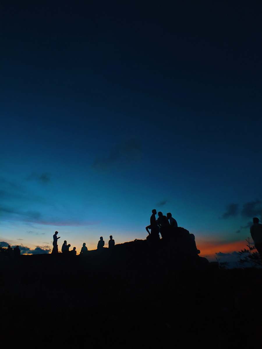nature silhouette of people under blue sky outdoors