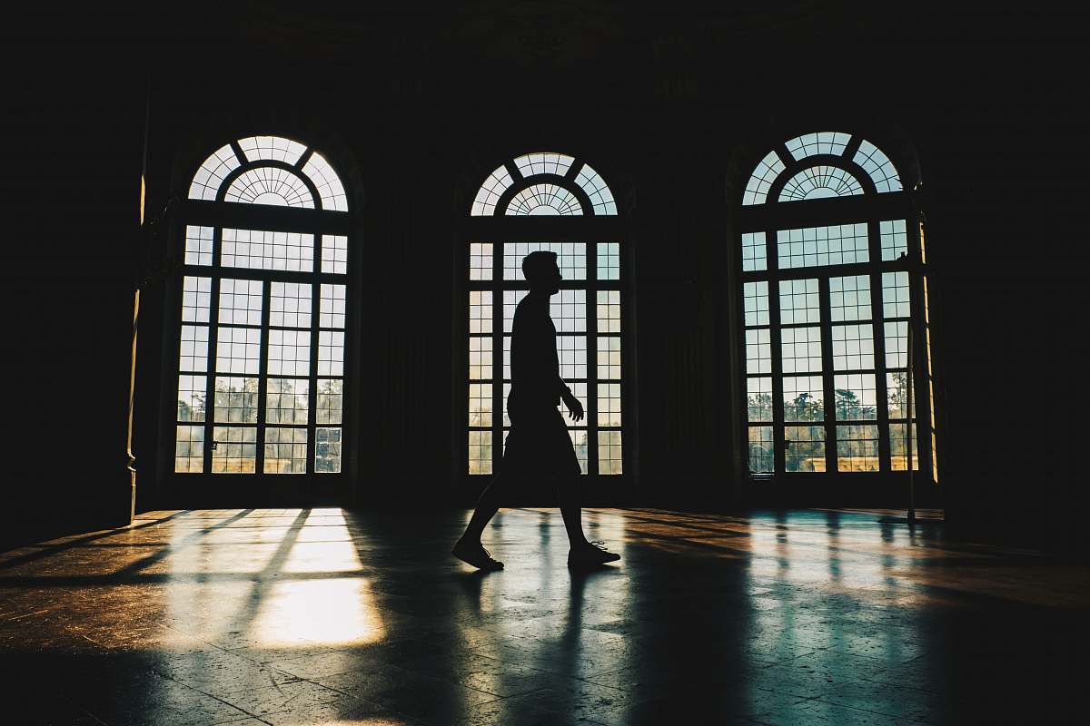 person silhouette of person inside building people